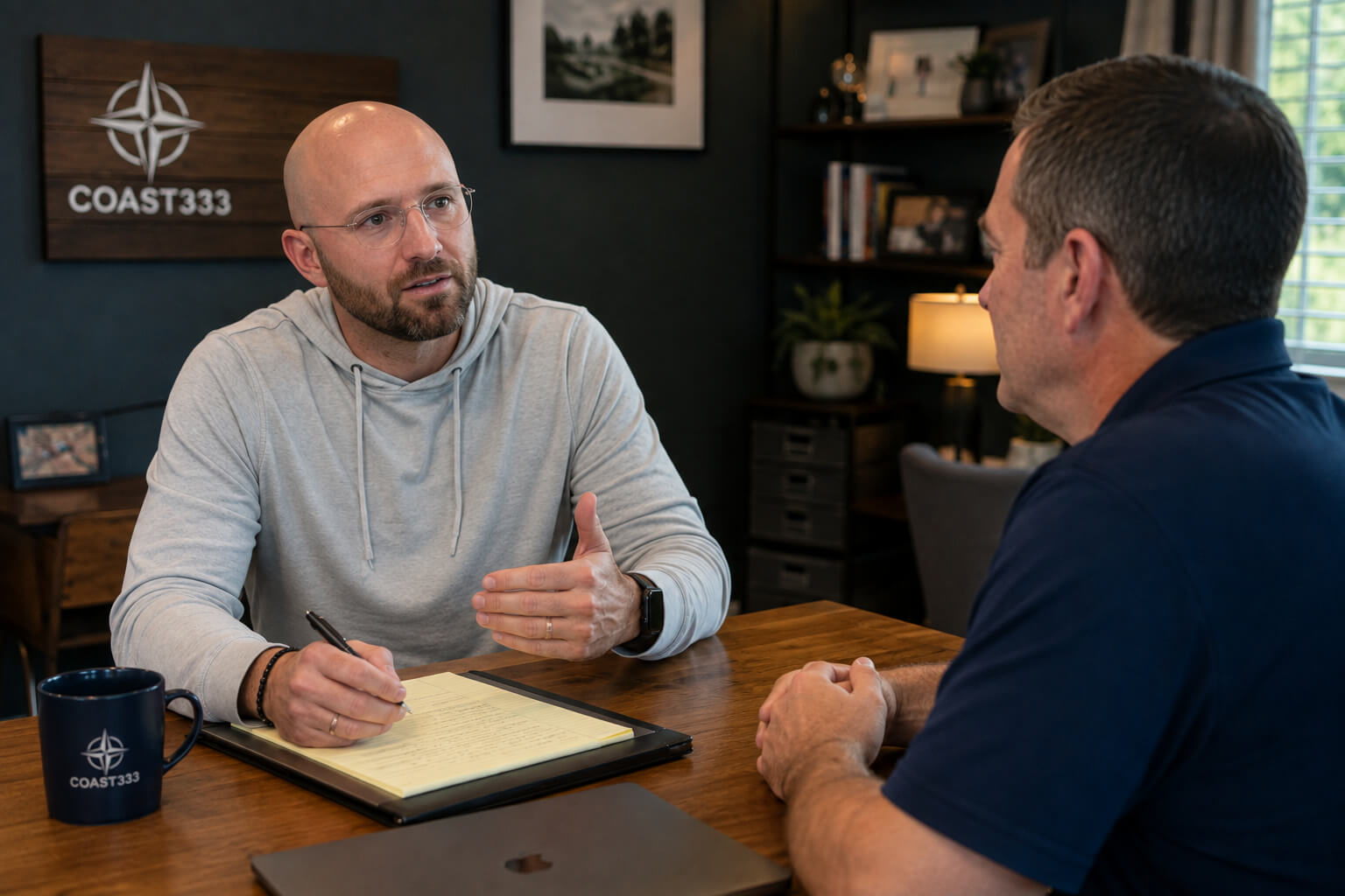 Business owner asking questions before hiring a marketing agency during a strategy meeting